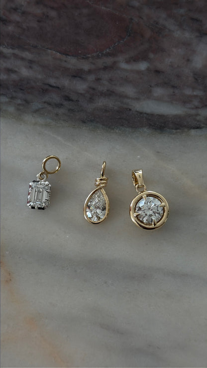 Three gold diamond pendants from Daily Diamonds