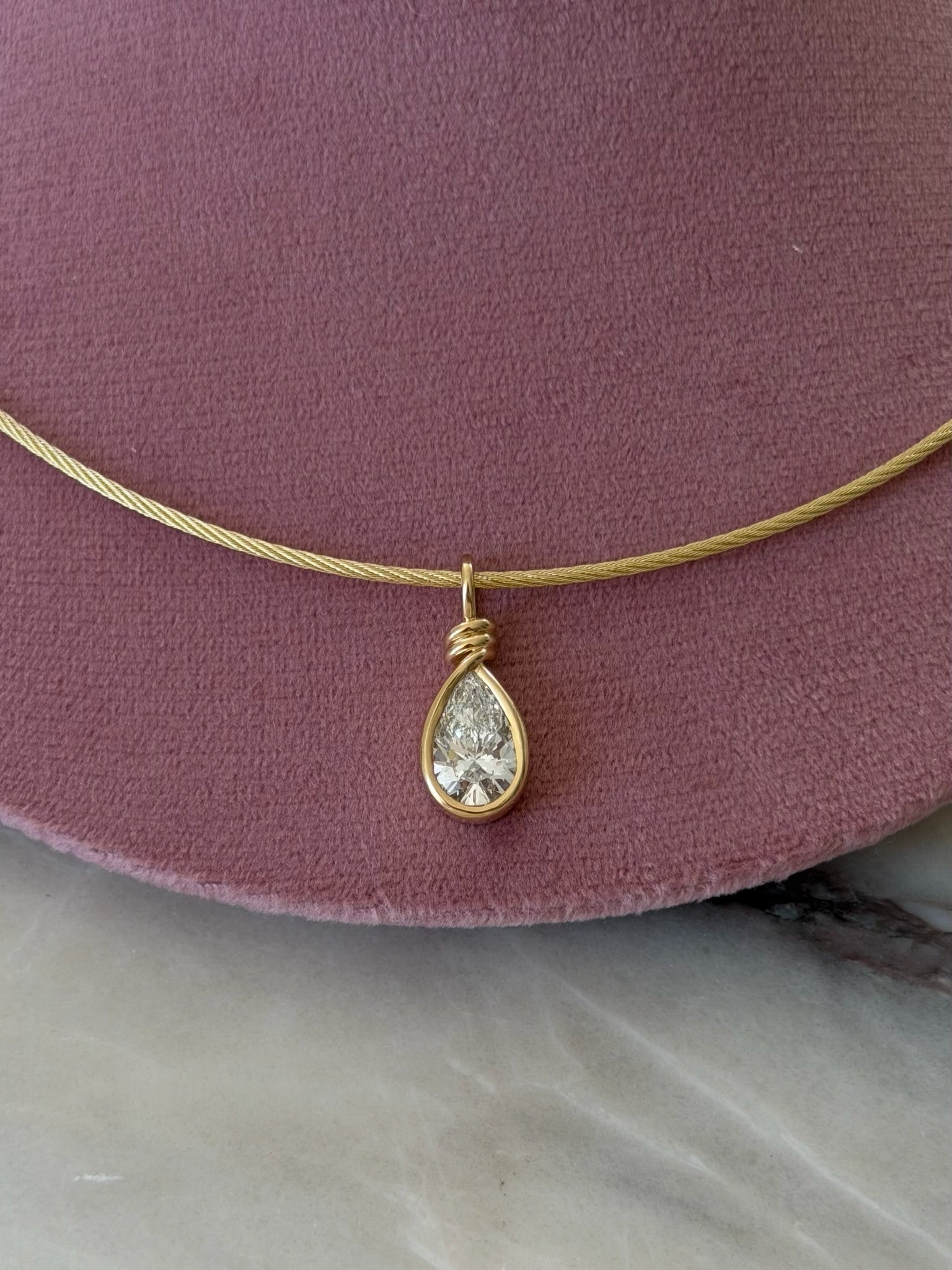 Daily Diamonds Gold necklace with a teardrop-shaped diamond pendant 