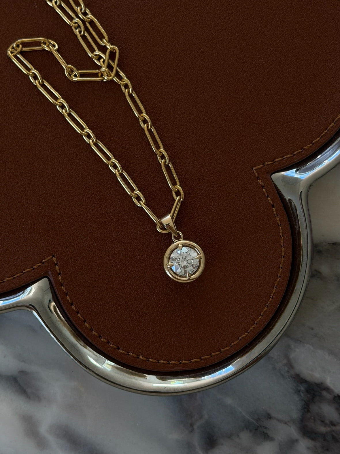 Daily Diamonds Gold chain necklace with a diamond pendant 